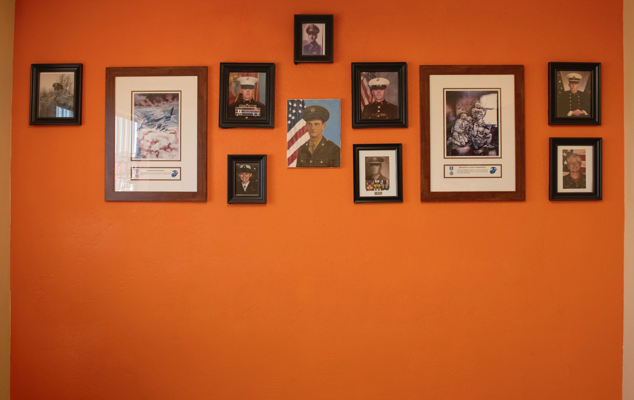 Military portraits wall at M&M Workshop
